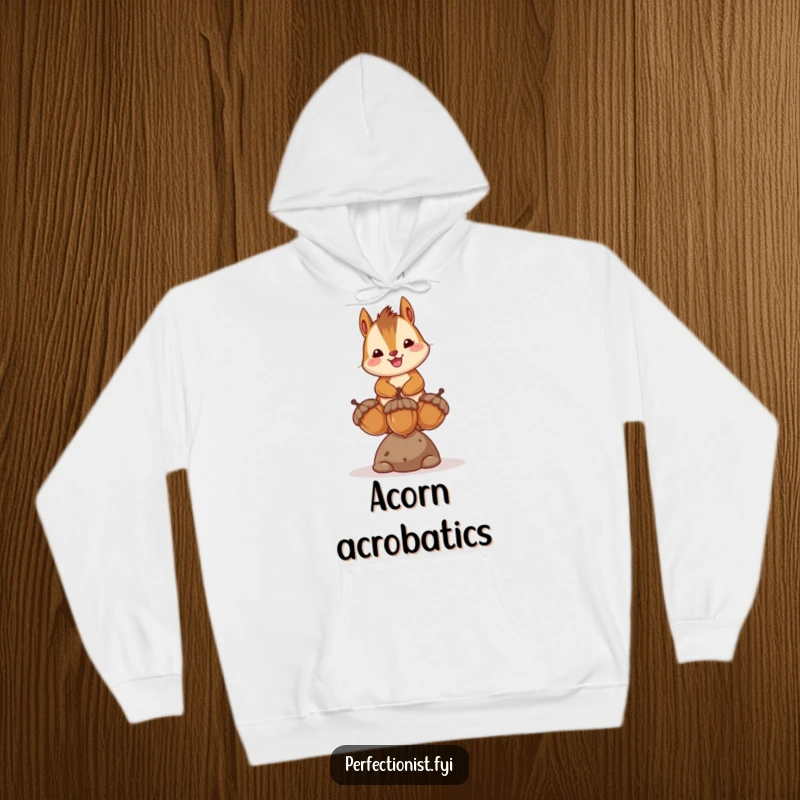 Funny hoodie depicting a happy chipmunk character balancing acorns, perfect for expressing a love for nature and humor.