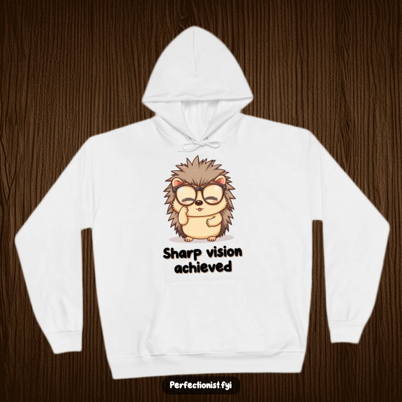 Funny hoodie featuring a diligent hedgehog character meticulously cleaning its spectacles, perfect for cozy moments and sharp minds.