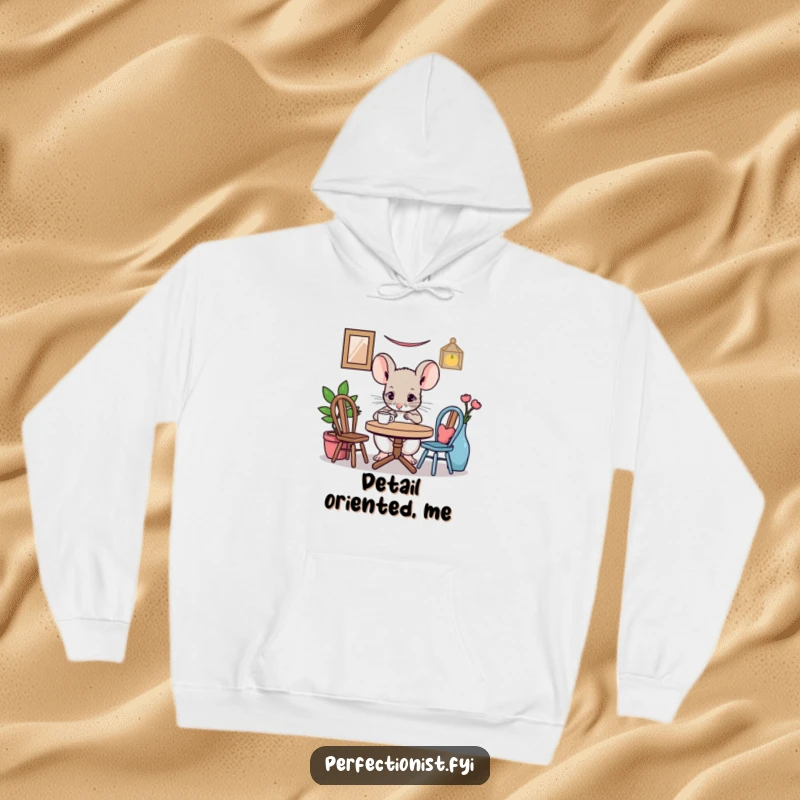 Funny mouse hoodie with a focused mouse character adjusting a miniature table setting, offering warmth and humorous appreciation for tiny details.