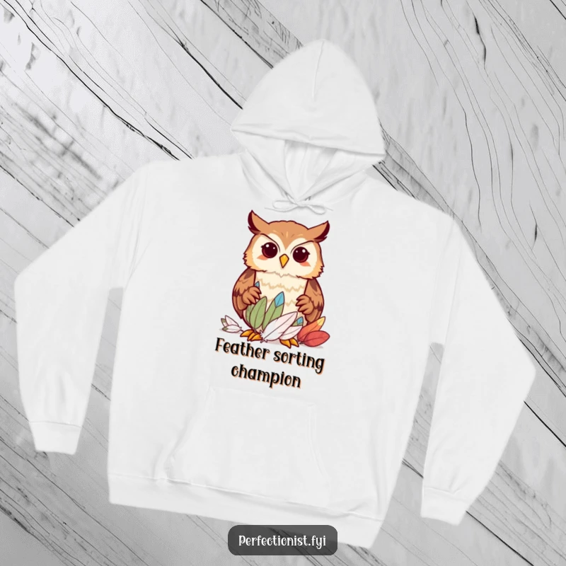 Funny owl character meticulously sorting feathers by size on a hoodie, perfect for cozy, humorous, and organized individuals as a gift.