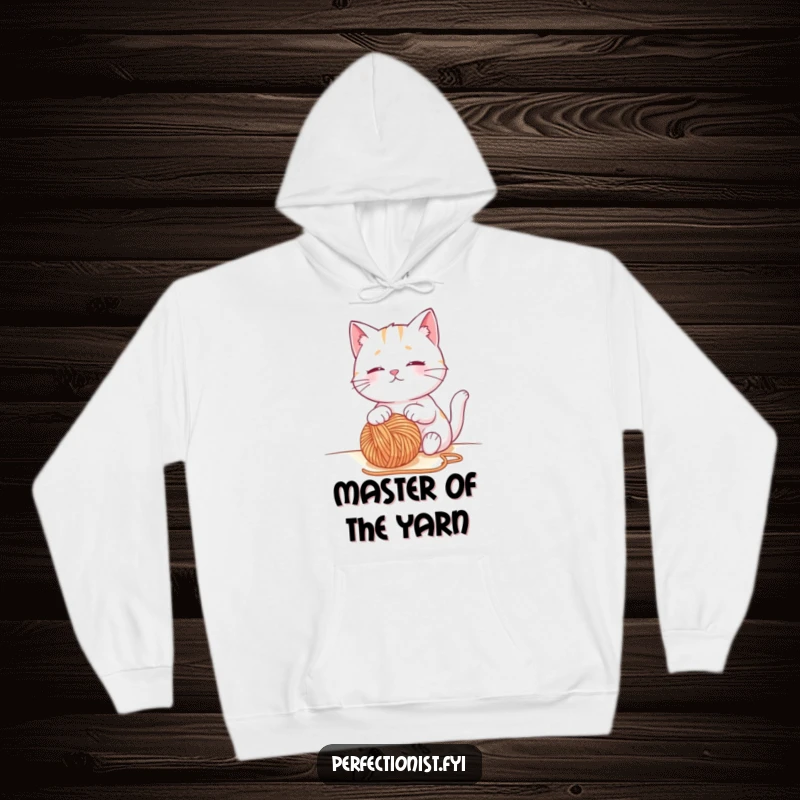 Funny cat hoodie with a contented cat character observing a perfectly placed ball of yarn, a comfortable and humorous gift for knitters.