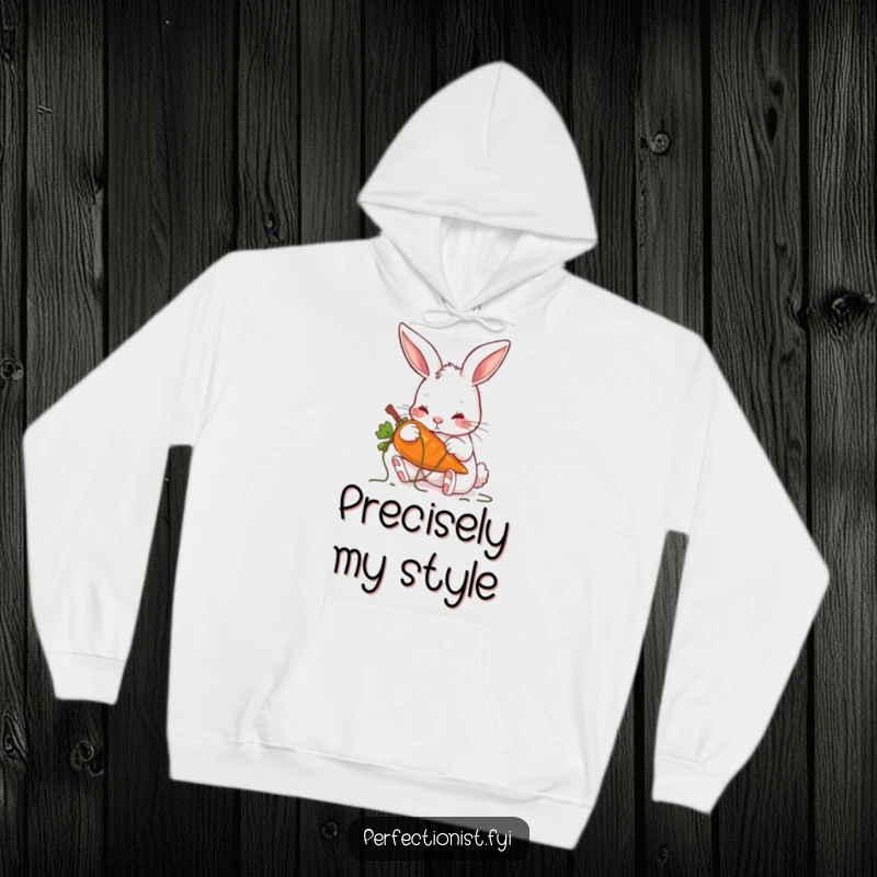 Funny hoodie depicting a rabbit meticulously grooming a carrot, symbolizing dedication to perfection and tidiness.