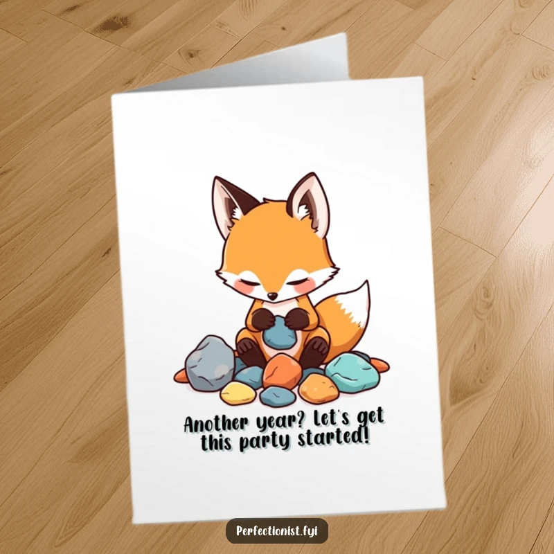 Funny free printable birthday card: a playful fox carefully sorting rocks by shade and feel, celebrating a birthday.