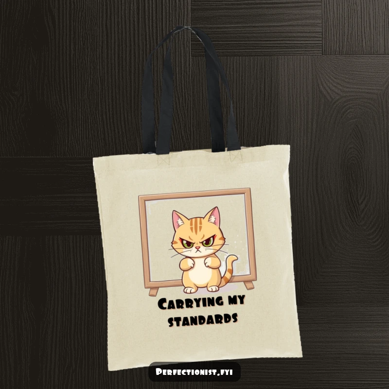 Funny tote bag showing a cat giving a stern look after straightening a crooked painting, perfect for carrying essentials.